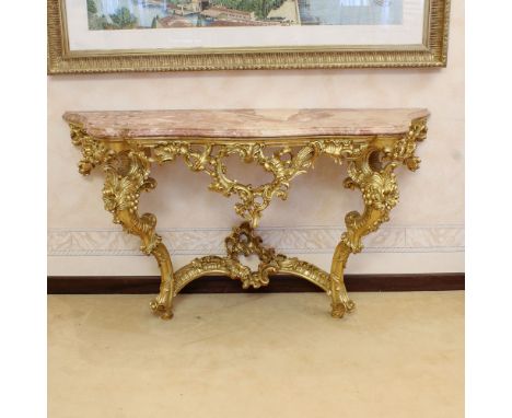 Golden wood console Italy, 20th centurystructure perforated and carved with floral and volute patterns, shaped top in marble9