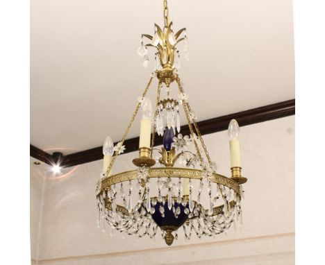 Four lights chandelier in golden bronze and opal glass Italy, 20th centurystructure openworked and chiseled with Empire-style