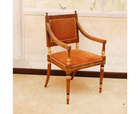 Wooden and golden wood armchair Italy, 20th centurystructure decorated with bronzes and golden elements in wood, fabric uphol