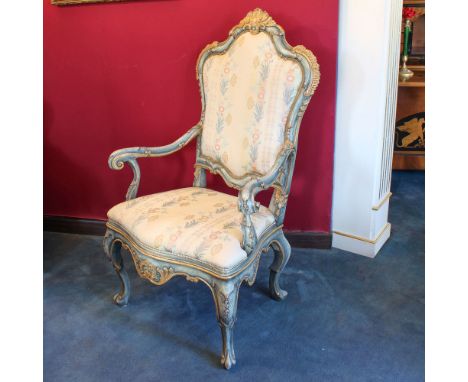 Lacquered and golden wood armchair Italy, 20th centuryshaped line structure carved with vegetal motifs and volutes, moved lin