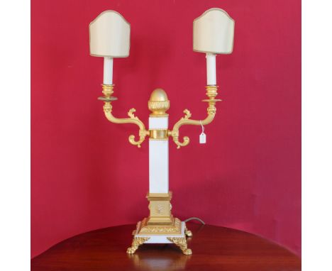Two-light candlestick in gilded bronze and marble Italy, 20th centurychiseled body with Empire-style motifs, stem and base in