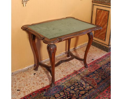 Walnut game table Italy, XVIII-XIX sec.shaped top partially covered in green velvet, resting on four moved line legs joined a
