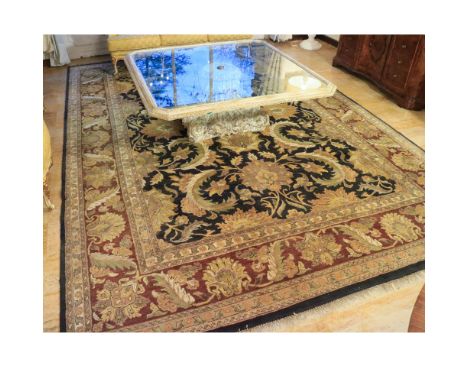 Oriental carpet 20th centurydecorated with plant patterns on a black and brown background, defects430x300 cm.