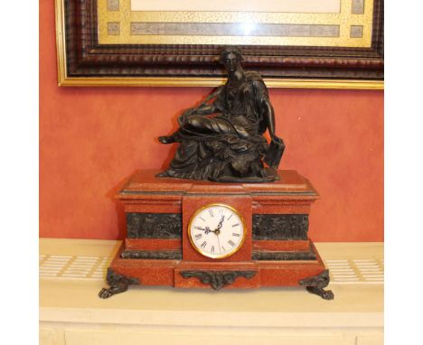 Resin table clock Italy, 20th centurydecorated with characters and plant motifs, circular dial with Roman numerals45x40x20 cm