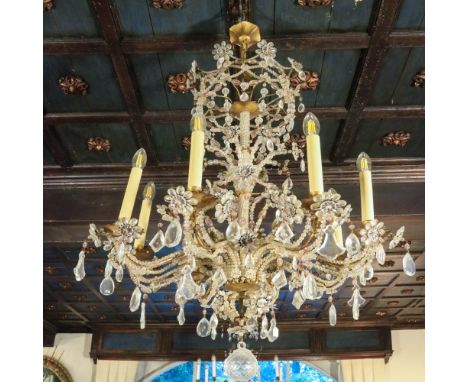 Eight-lights chandelier Italy, 19th-20th centuryin metal and glass125x70 cm.