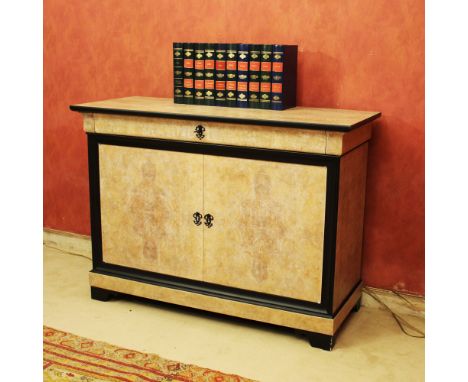 Ebonized and pickled wood sideboard Italy, 20th centuryrectangular top with a drawer and two doors underneath90x124x50 cm.