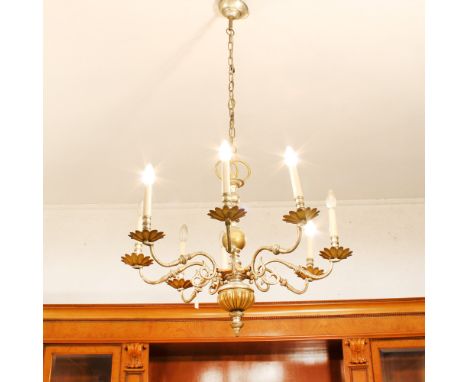 Eight lights chandelier Italy, 20th centuryin silver and golden metal, turned body, arms shaped with vegetal motifs68x80 cm.
