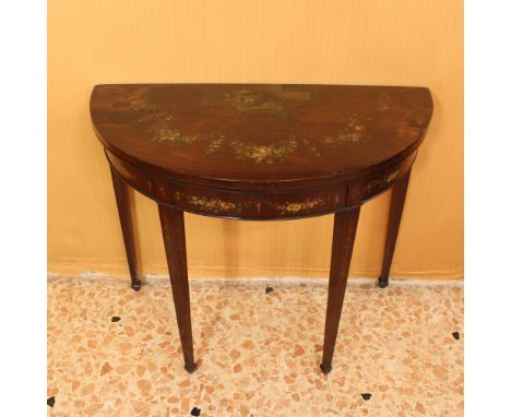 Mahogany game table England, 19th centuryPolychrome decorated body with floral garlands, opening top partially covered in clo