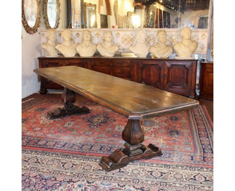 Walnut refectory table Italy, 20th centuryoctagonal top resting on two balustrade supports80x312x85 cm.