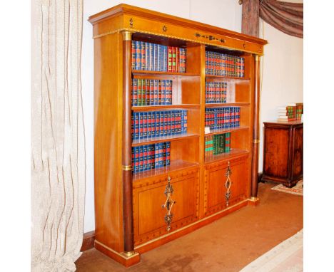 Empire style bookcase in cherrywood Italy, 20th centuryopen front with various compartments and four doors underneath, decora