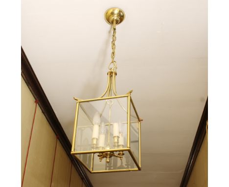 Bronze and glass lantern France, 20th centurysquare shape with a central part of four lights60x30x30 cm.