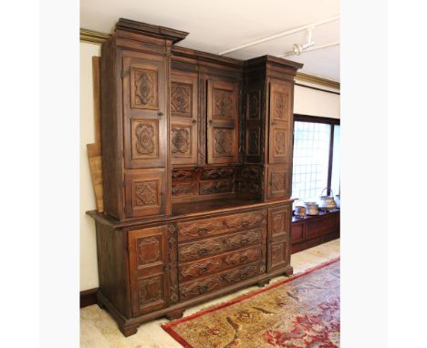 Antique walnut sacristy furniture Italy, 17th-18th century.ashlar front with numerous doors, drawers and compartments of vari