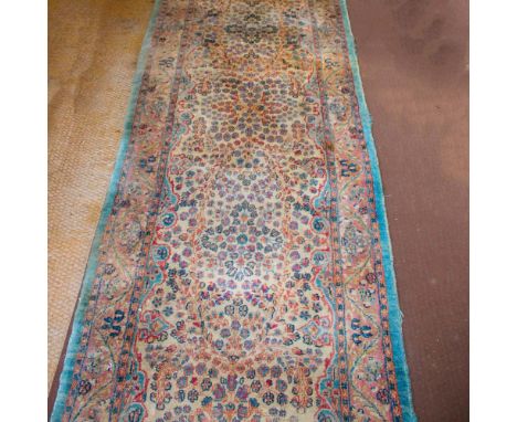 Carpet runner 20th centurydecorated with floral patterns on a multicolor background, defects620x86 cm.
