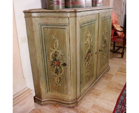 Lacquered wood cornered sideboard Italy, 18th centurypolychrome decorations with plant and floral motifs, shaped top with fou