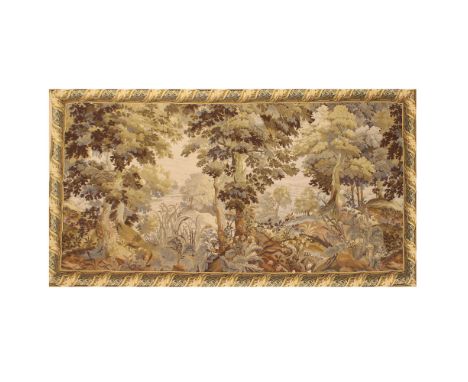 Flemish tapestry 20th centurydecorated with forest landscape and vegetal motifs, slight defects327x157 cm.