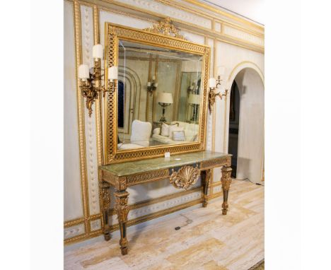 Gilded and lacquered wood console with mirror Italy, 20th centuryperforated and carved structures with rich plant motifs, def