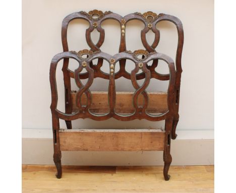 Couple of bed headboards Italy, 19th centuryin wood and gilded wood, openworked and carved backrests with floral and vegetal 