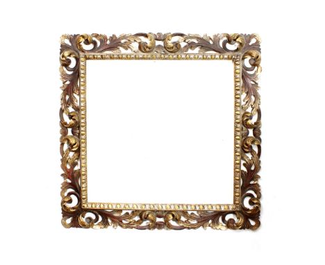 Silver wood mirror Italy, 20th centurysquare frame podded and carved with shells and opposite volutes motifs, defects124x124 
