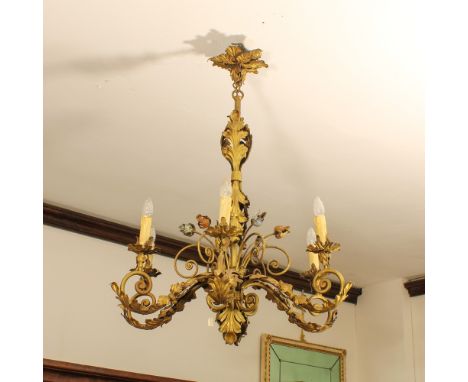 Six lights golden iron chandelier Italy, 19th centuryforged with vegetal and floral motifs100x80 cm.