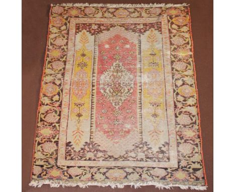 Oriental carpet 20th centurydecorated with plant patterns on a beige background, wears146x101 cm.
