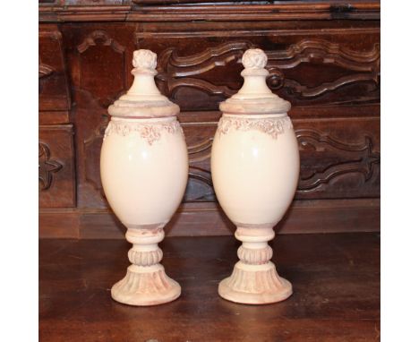 Pair of ceramic potiches Italy, 20th centurypodded and decorated with plant motifsh. 40 cm.