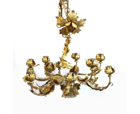 Bronze twelve lights chandelier Italy, 20th centurystructure richly decorated with vegetal motifs, slight defects60x70 cm.