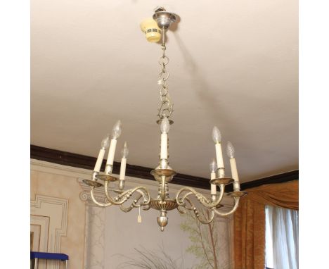 Eight lights silver metal chandelier Italy, 20th centuryturned body, shaped line arms60x70 cm.