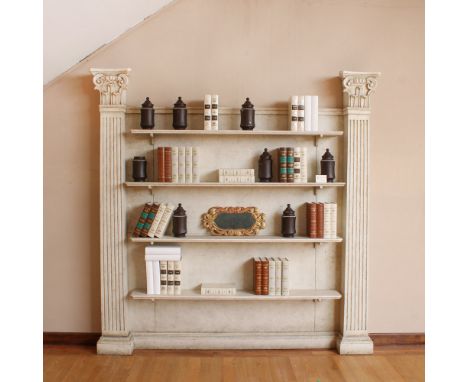 Lacquered wooden bookcase Italy, 20th centuryfront with four shelves delimited by two pilasters with capitals, slight defects