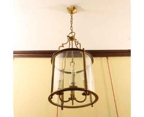 Bronze and curved glass lantern France, 20th centurycircular body with central part of four lights and shaped arms60x32 cm.
