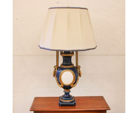 Ceramic table lamp Italy, 20th centurygilded and blue glazed, circular body decorated with Greek frieze and vegetal garlands,