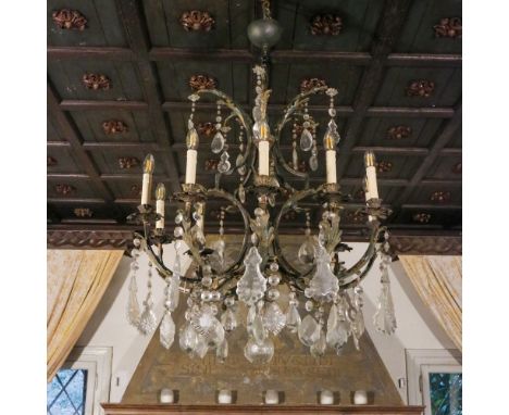Ten-lights chandelier Italy, 20th centuryin bronze and crystal, defects80x75 cm.