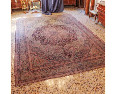 Oriental carpet XIX-XX sec.decorated with plant and floral patterns on a multicolor background, wears442x280 cm.
