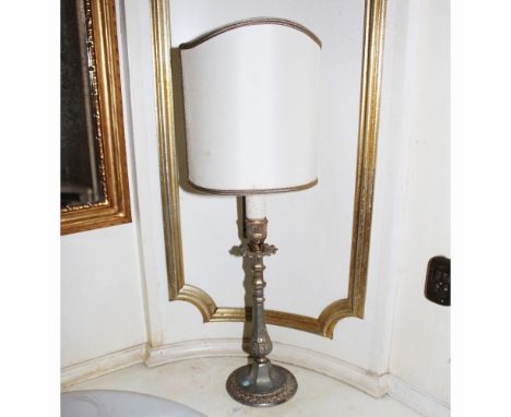 Pair of bronze table lamps Italy, 20th centurychiseled with plant motifs, complete with a lampshadeh. 47.5 cm