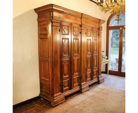 Large walnut wardrobe Italy, 18th centuryfront with four ashlar doors, defects240x260x63 cm.