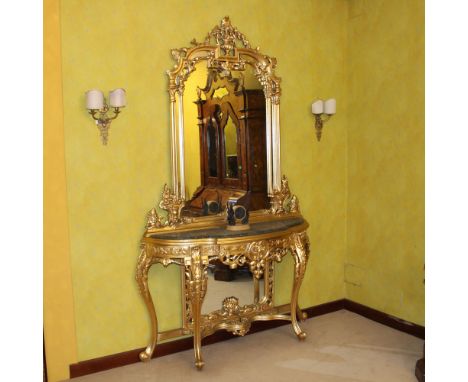 Console with mirror in gilded wood Italy, 20th centurycarved structure with floral and plant motifs, green marble top252x144x