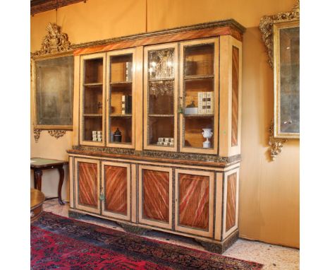 Lacquered wooden bookcase Italy, 19th centurydecorated to simulate marble, eight doors front, four of which in glass252x245x5