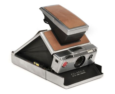 * Polaroid SX-70 Instant Land Camera. Polaroid SX-70 Instant Land Camera, tan leather version, the world's first folding SLR 
