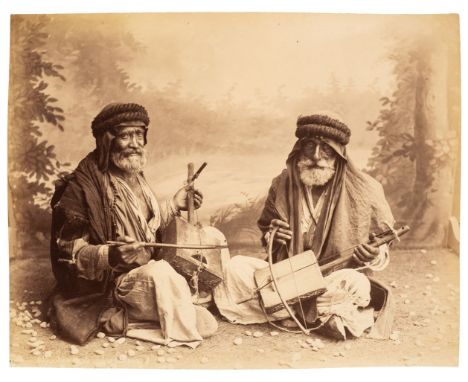 * Middle East. An album of 50 views and scenes, circa 1890, albumen print photographs of local types, scenes and buildings in