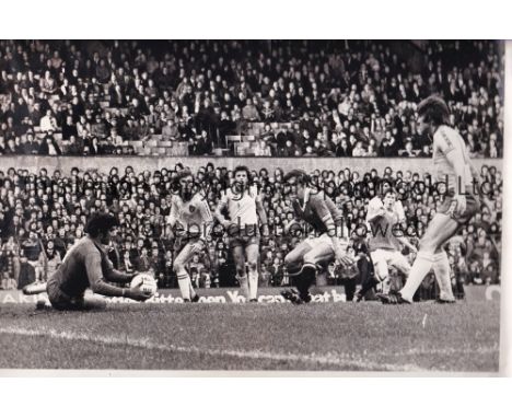 MAN UNITED    Four Black &amp; White Press Photos of Manchester United in action in the 1970's plus a Red Devils Souvenir Sho
