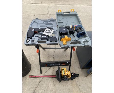 AN ASSORTMENT OF TOOLS TO INCLUDE A WORKMATE, A PETROL HEDGE TRIMMER AND A RYOBI BATTERY DRILL ETC 