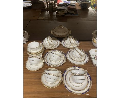A COLLECTION OF MINTON 'NEW YORK CITY' TEAWARE TO INCLUDE A LIDDED SERVING BOWL, CUPS, SAUCERS AND SIDE PLATES 
