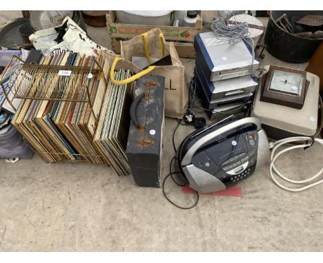 A LARGE ASSORTMENT OF ITEMS TO INCLUDE LP RECORDS, CD PLAYERS AND A SATNAV ETC 