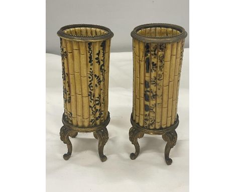 A PAIR OF VINTAGE ORMOLU AND CERAMIC SPILL HOLDERS IN A BAMBOO DESIGN 