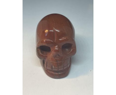 A MINATURE AGATE STONE SKULL 
