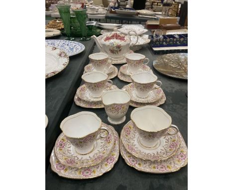 A WINDSOR SET OF SIX TRIOS,CAKE PLATE AND A CREAM JUG IN A FLORAL PATTERN PLUS A PARAGON 'BIRD OF PARADISE' TEAPOT 