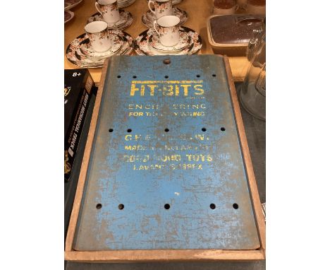A VINTAGE 'FIT-BITS' CHILD'S CONSTRUCTION TOY IN ORIGINAL WOODEN BOX 