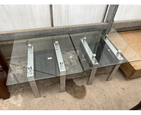 A PAIR OF RETRO LAMP TABLES WITH GLASS TOP, UNDERTIER OF BLACK GLASS ON POLISHED CHROME LEGS, EACH 25.5" SQUARE 