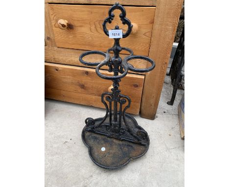 A VINTAGE CAST IRON UMBRELLA/STICK STAND 