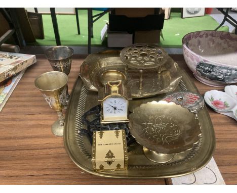 A QUANTITY OF BRASSWARE TO INCLUDE A LARGE TRAY, BOWL, GOBLETS, TRIPOD, SMALL CLOCK, ETC 