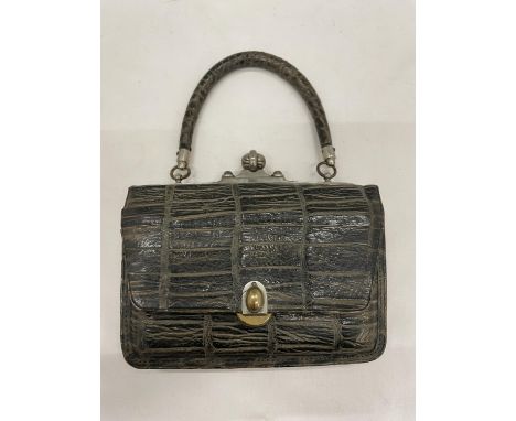 A VINTAGE PURSE WITH VANITY KIT AND NOTEBOOK 
